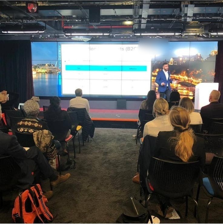 Jay presenting on Google Ads performance to an audience